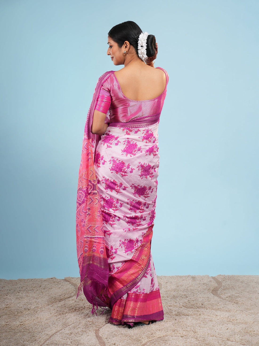 Pink Vegan Silk saree with jacquard border, draped full-length for a Navratri evening — Koshnika