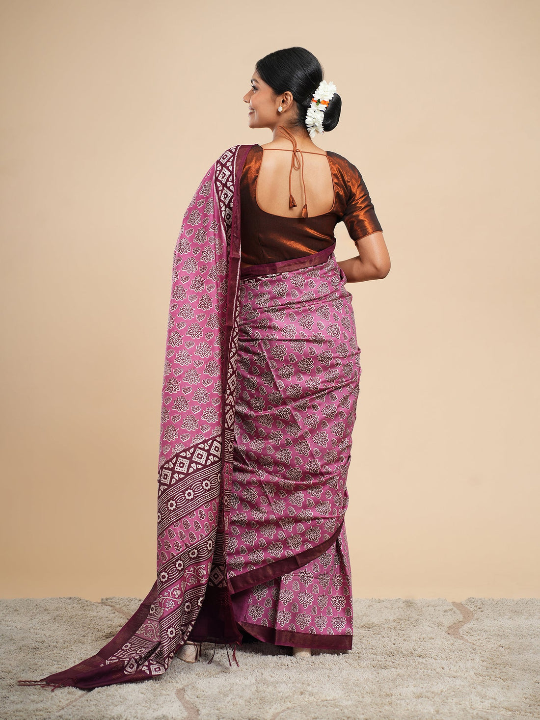 Pink Modal saree draped full-length, shown for a modal vs viscose saree comparison — Koshnika
