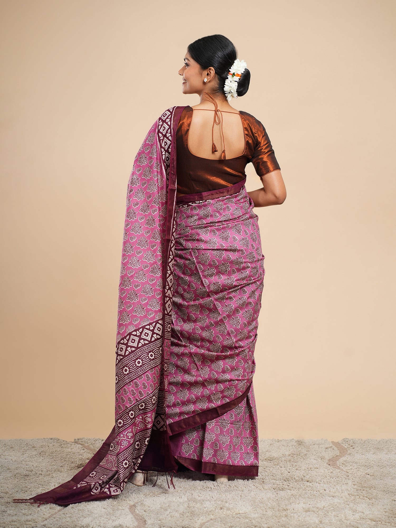 Pink Modal saree draped full-length, shown for a modal vs viscose saree comparison — Koshnika