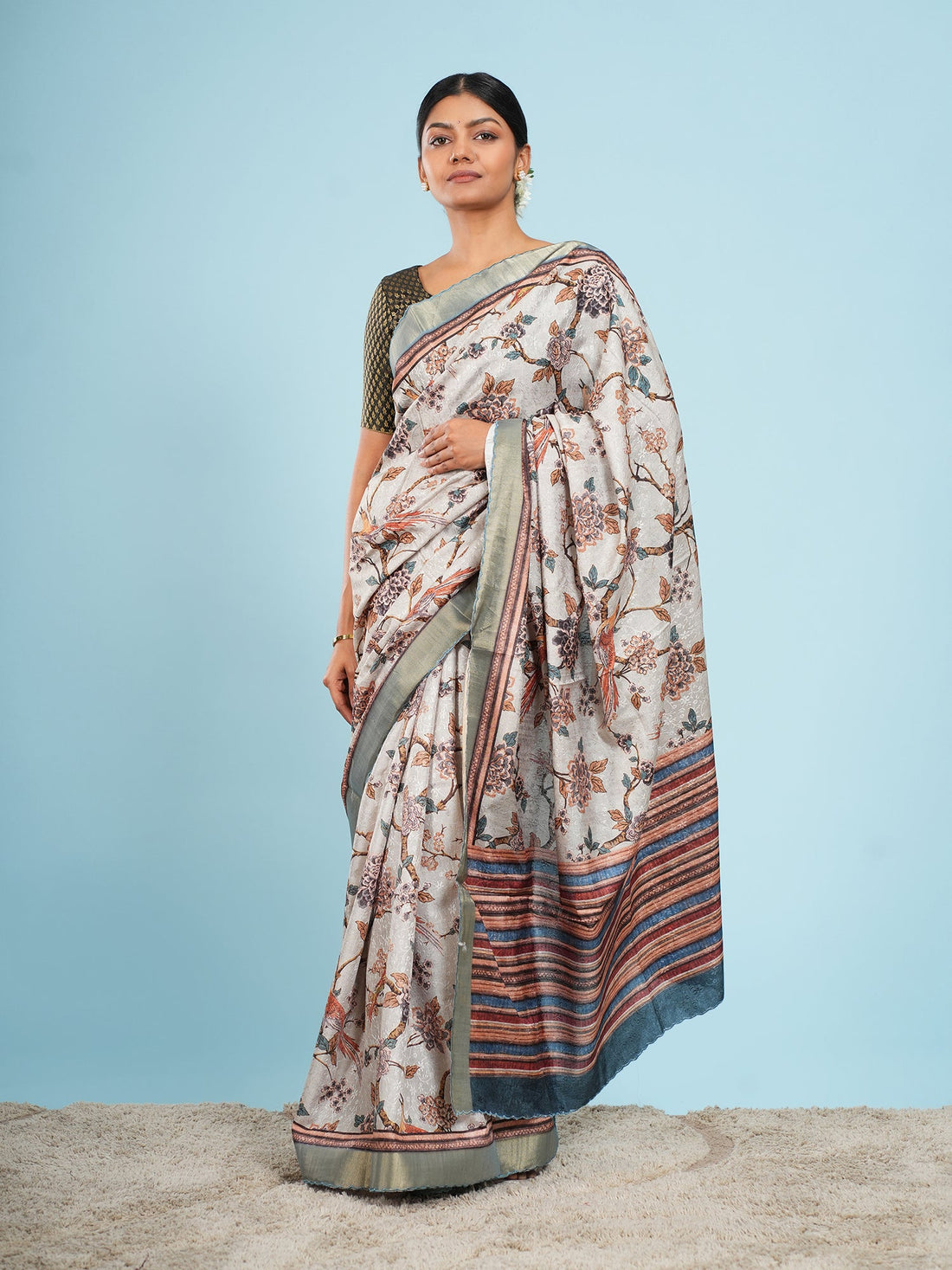 Mist grey self-jacquard saree with a sage border, draped full-length — Koshnika