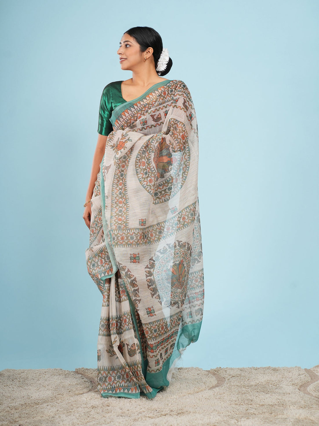 Ivory Tussar saree with Madhubani-inspired border, draped full-length for Durga Puja — Koshnika
