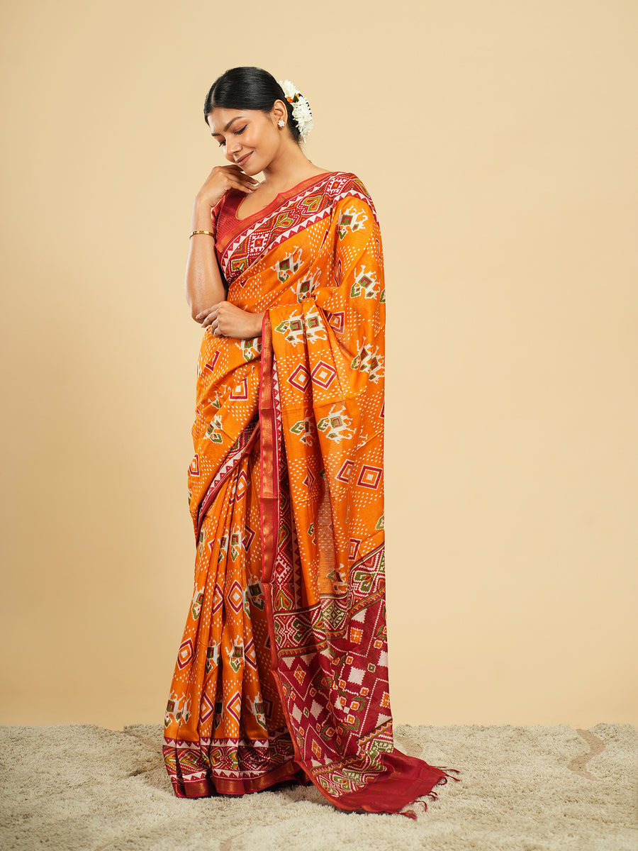 Orange Modal Patola-print saree, orange-red border detail – Koshnika