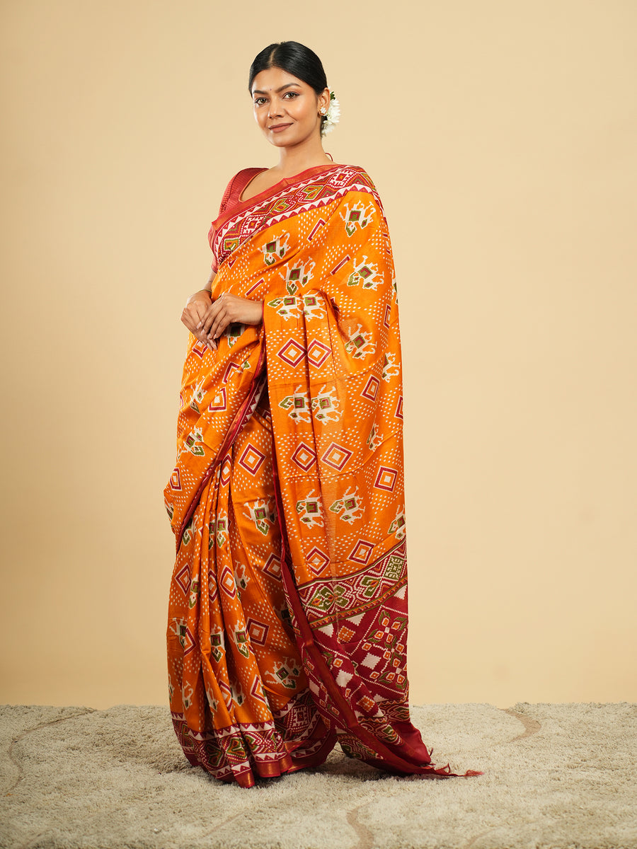 Orange Modal Patola-print saree, fabric texture close-up – Koshnika