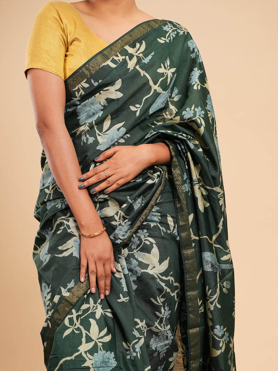 Dark green floral block-print saree, fabric texture close-up – Koshnika