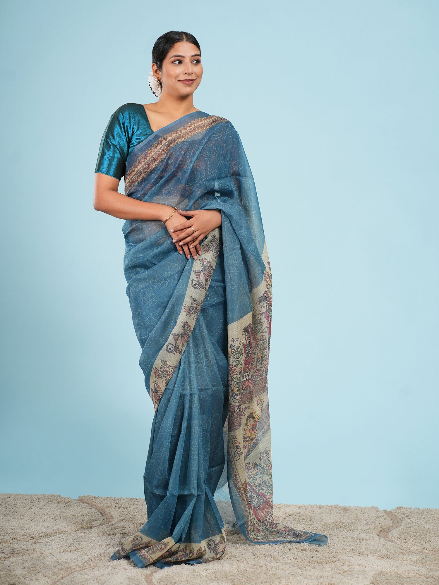 Nirjara Madhubani print on Tussar-Teal blue
