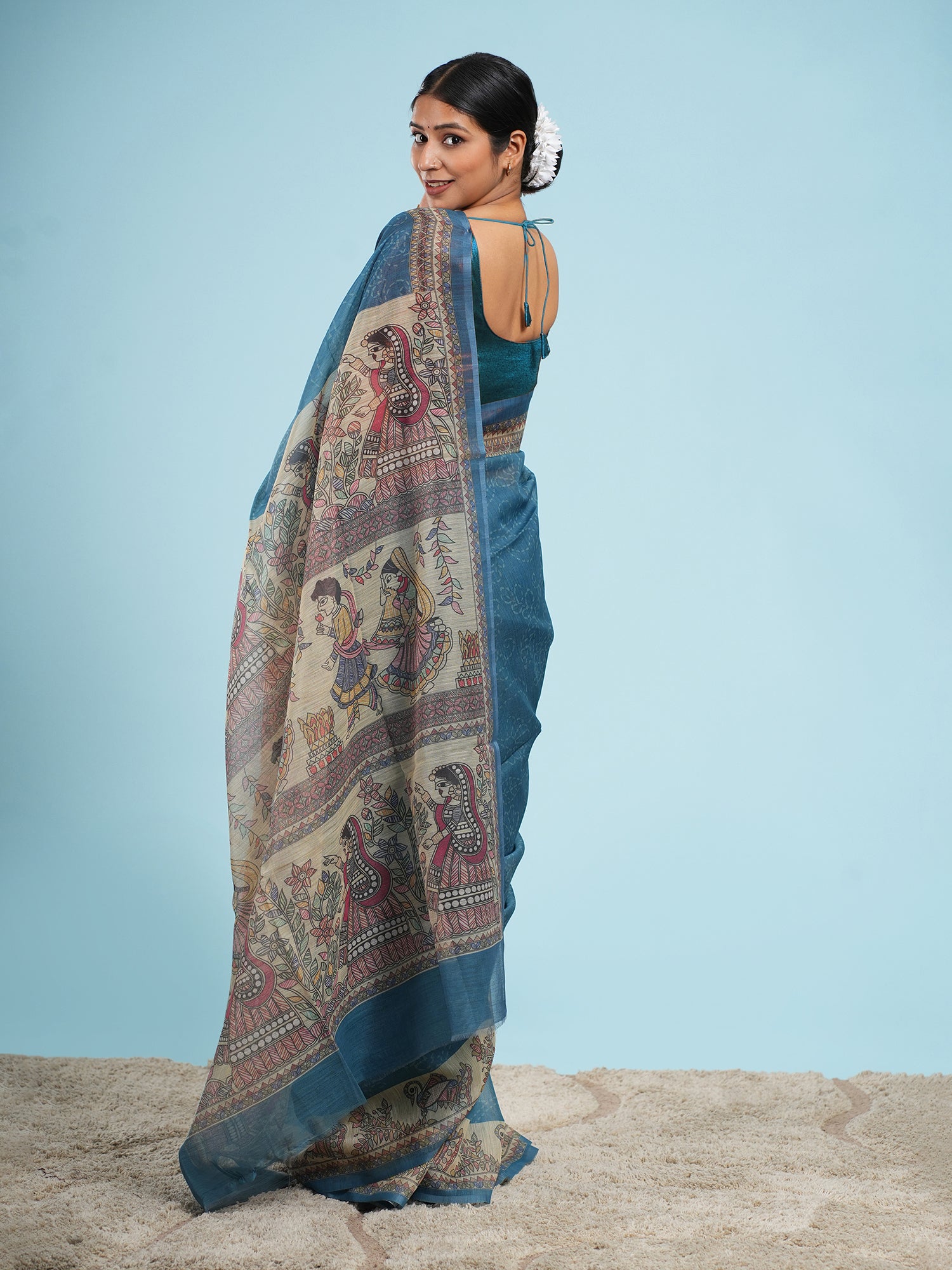 Nirjara Madhubani print on Tussar-Teal blue