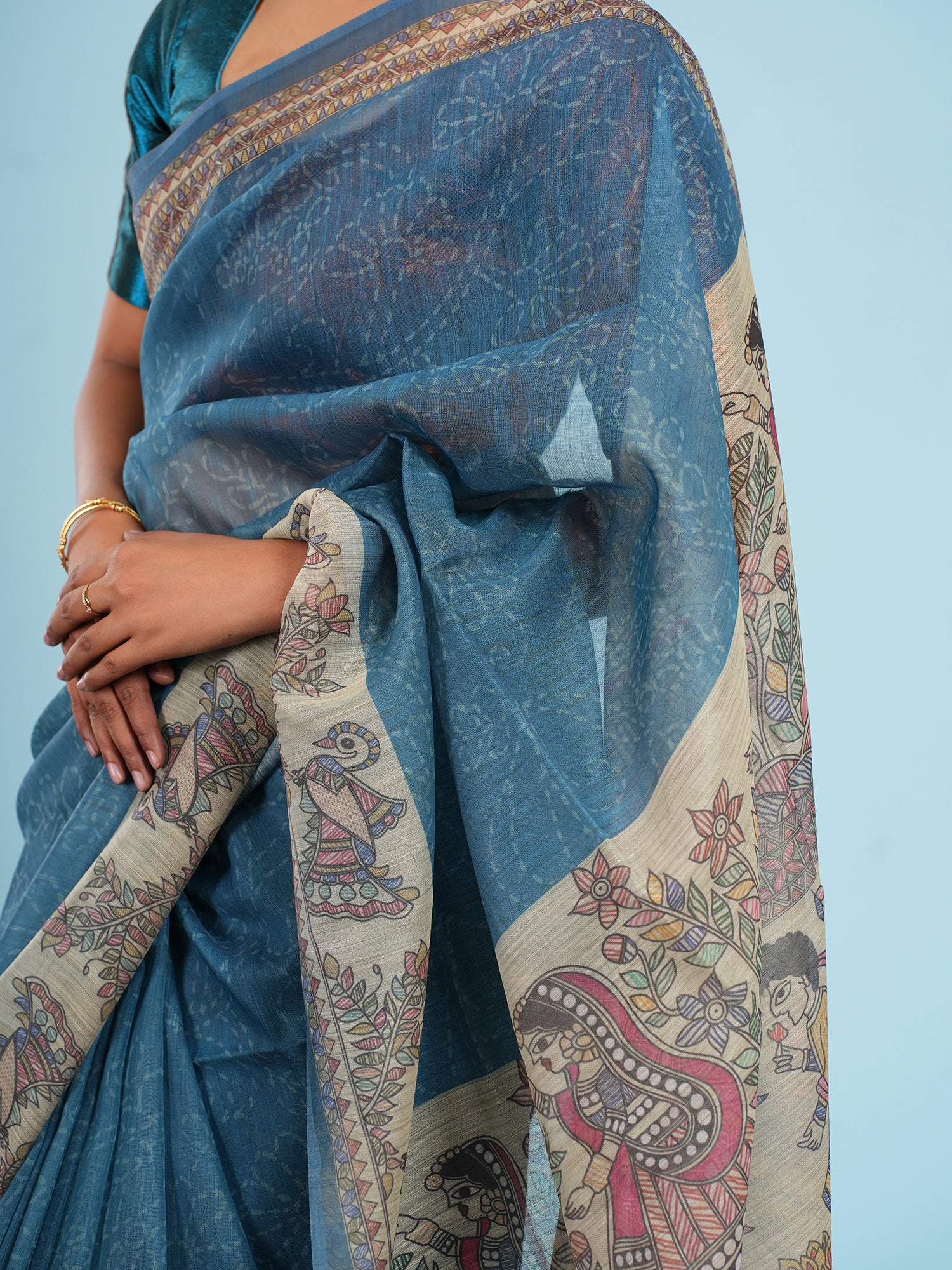 Nirjara Madhubani print on Tussar-Teal blue